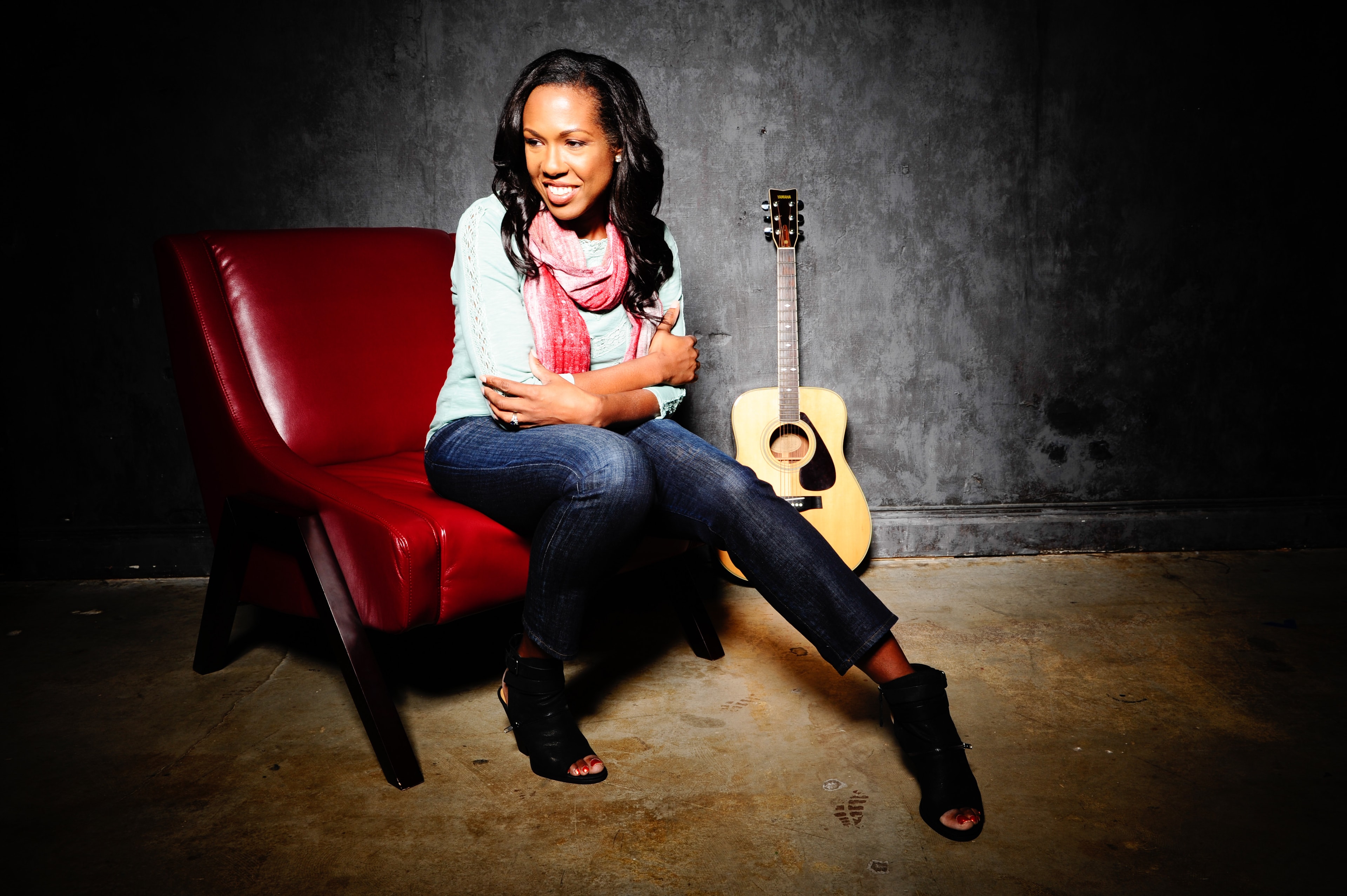 Alice Esther with her guitar